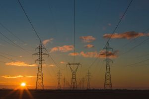 Image of Pylons and Grid electricity in the sunset